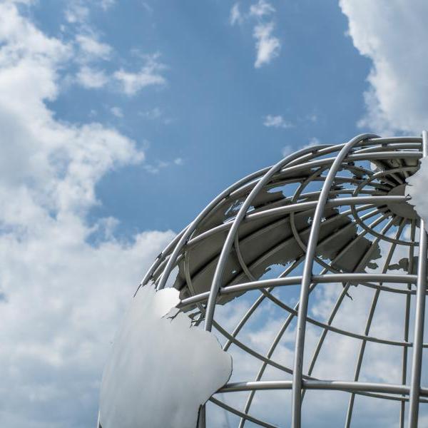 Campus Globe against cloudy blue sky